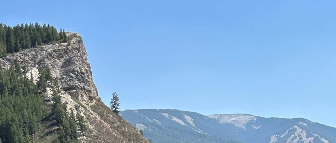 A wide view across the valley above Avon, with ski runs on the far ridgeline.